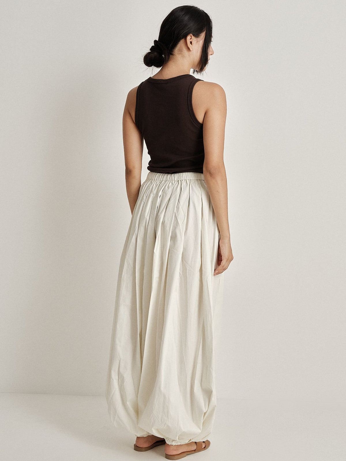 Pantalone plissé a gamba ampia