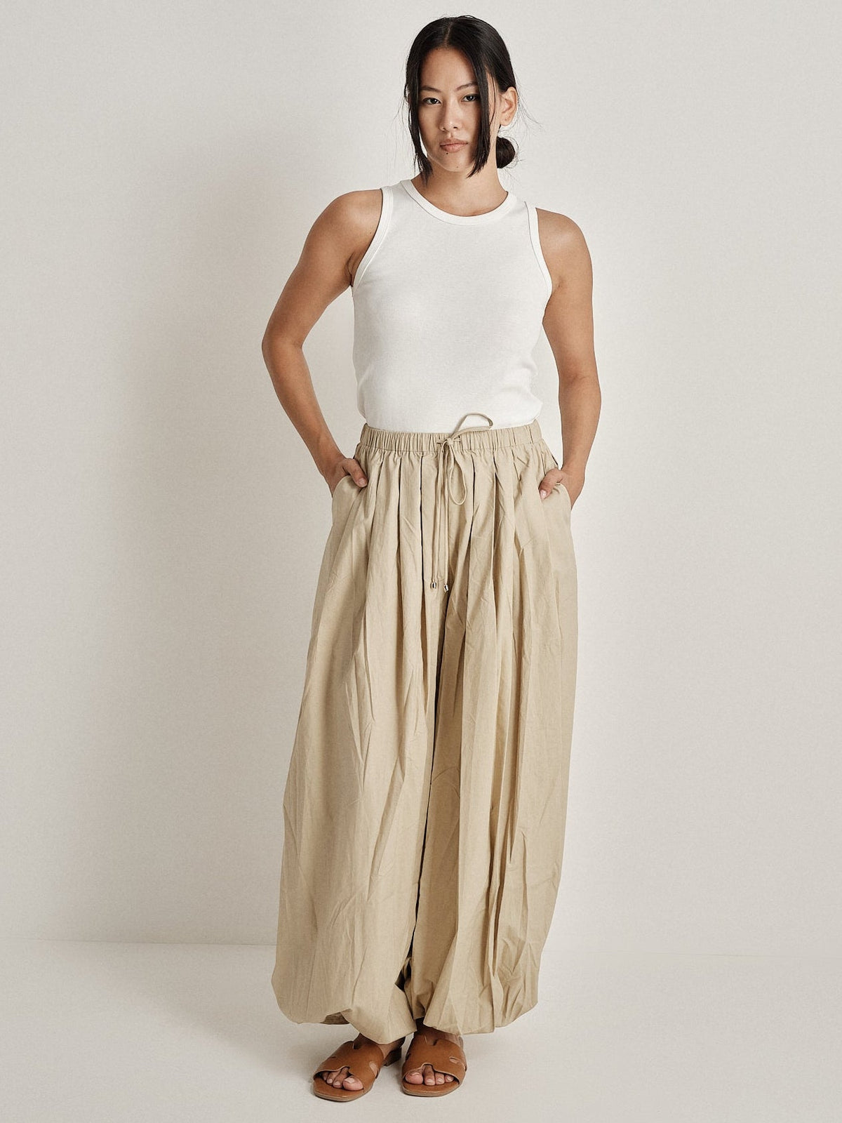 Pantalone plissé a gamba ampia