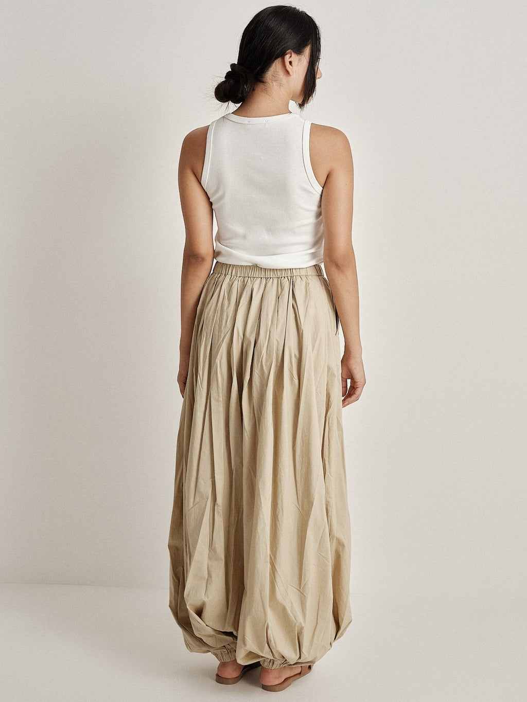 Pantalone plissé a gamba ampia