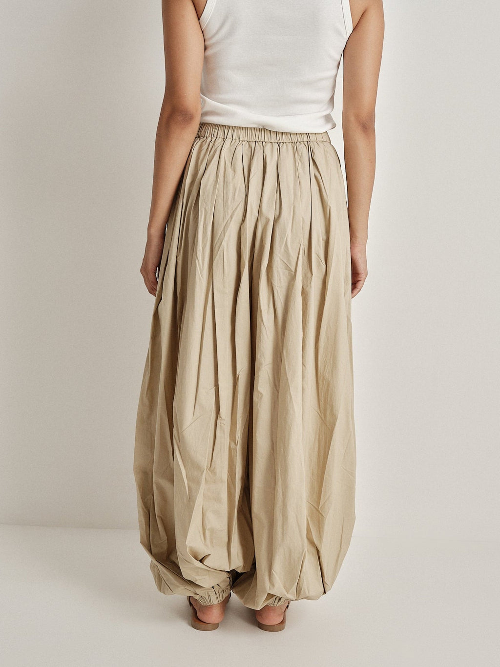 Pantalone plissé a gamba ampia