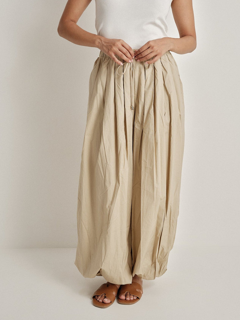Pantalone plissé a gamba ampia