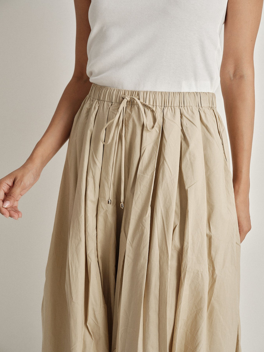 Pantalone plissé a gamba ampia