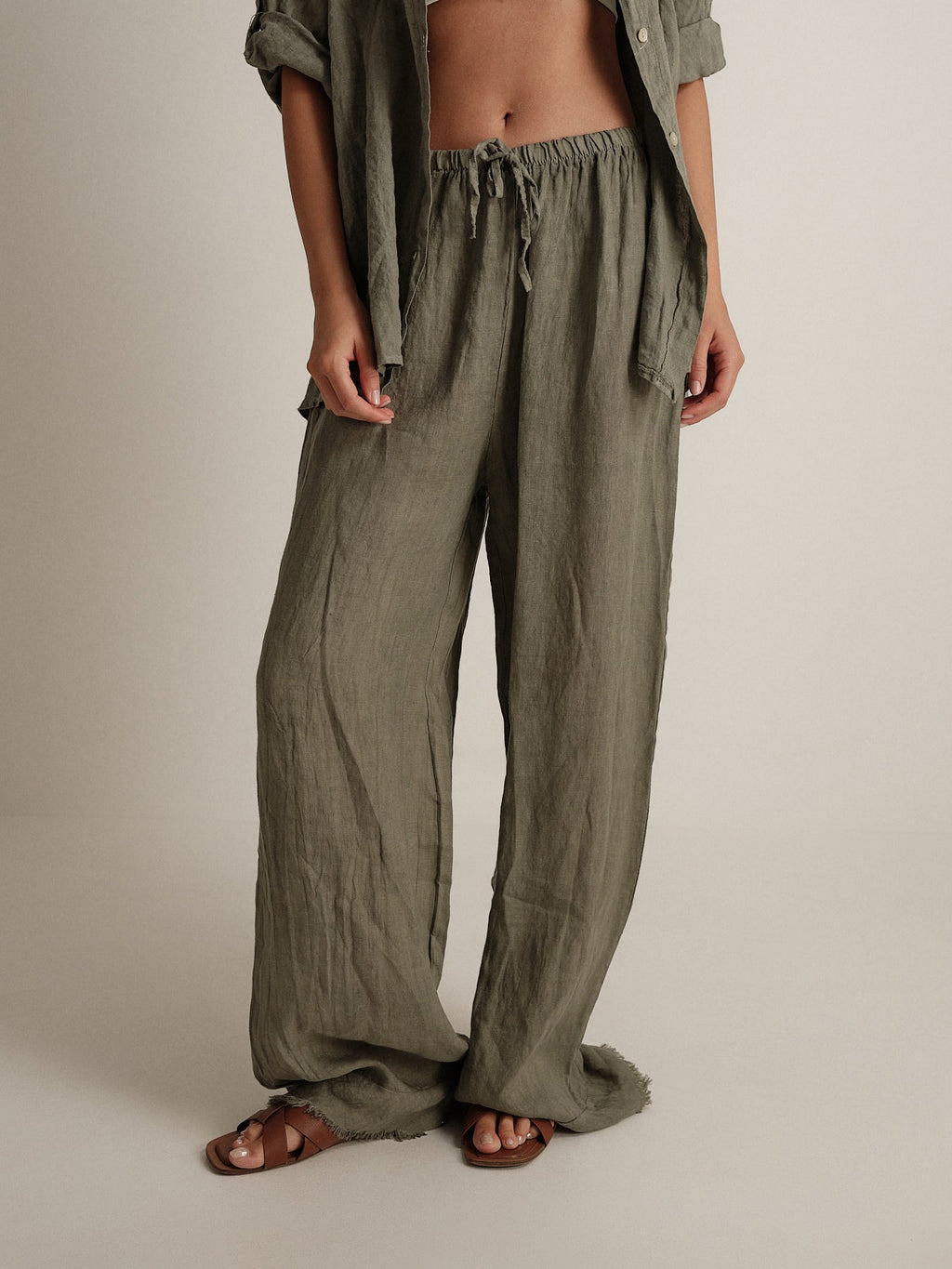 Pantalone in puro lino sfrangiato